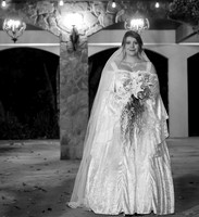 B&W night portrait of bride with bouquet